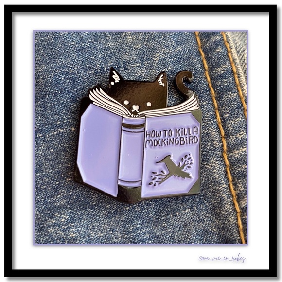 Cat reads “How to Kill a Mockingbird” - Picture 1 of 8